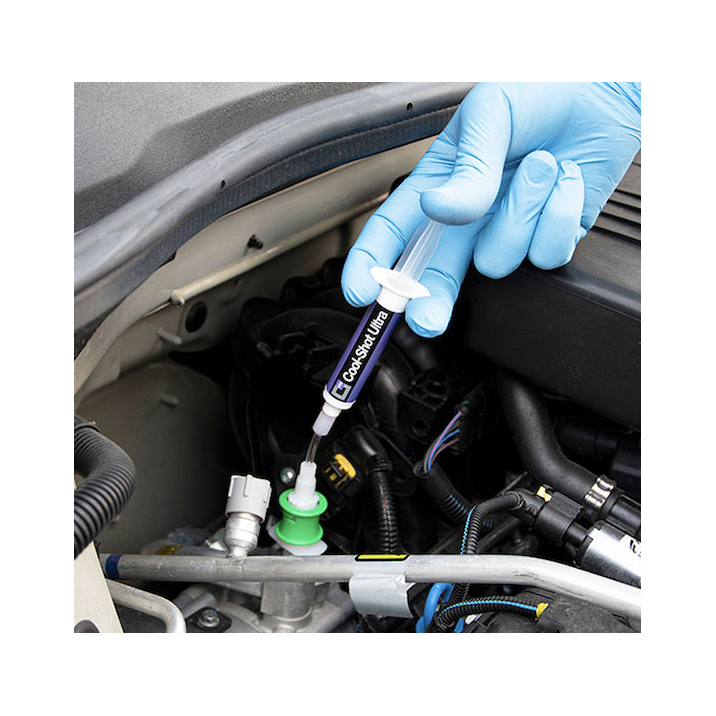 Cool-Shot Ultra being administered to a vehicle A/C system